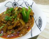 A picture of step 7 of Lauki gosht.