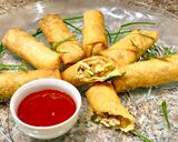 A picture of step 5 of Chicken and vegetables spring rolls.