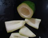 A picture of step 1 of Pepper Ghanto (Grated Green Papaya with Potato).