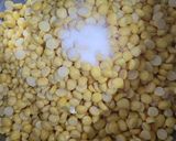 A picture of step 4 of Luchi and Cholar Dal.