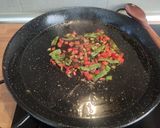 A picture of step 5 of Chicken and Vegetable Paella.