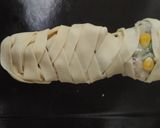 A picture of step 3 of Mummy kabab wrapped, hand garlic toast and eyeball punch.