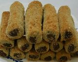 صورة لخطوة 16 من وصفة اصابع التمر بالسميد 😋😋😋