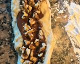 A picture of step 6 of Easter Rings Filled with Hazelnut Spread and Walnuts.