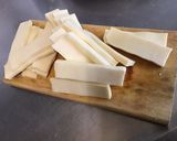 Une image de l'étape 16 de Gratin de polenta au lard, tomates, oignon, paneer et parmesan.