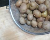 A picture of step 2 of Cheesy smashed potatoes.