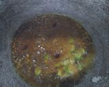 A picture of step 1 of Sev tomato sabji.