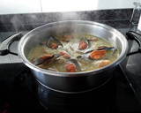 Foto del paso 4 de la receta: Arroz con mejillones y berberechos frescos
