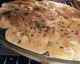 Foto del paso 8 de la receta Merluza del pincho al horno, con patatas y ajos