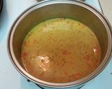 A picture of step 5 of Jamerican Curry Chicken & Rice Soup.