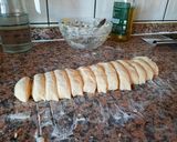 A picture of step 4 of Garlic Knots from scratch.