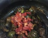 A picture of step 7 of Stuffed mushroom baingan masala.