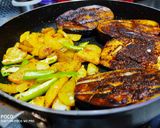 A picture of step 4 of Stuffed brinjal with potatoes.