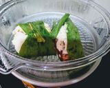 A picture of step 3 of Instant Haladipatra Pitha (pitha with turmeric leaf).