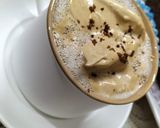 A picture of step 7 of Hand beaten frothy coffee.