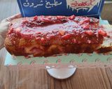 صورة لخطوة 7 من وصفة كيكة الفراوله🍓🍓 الهشة (بالجليز)