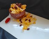 A picture of step 5 of Cornflakes peanut chivda.
