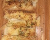 A picture of step 8 of Cheesy garlic bread sticks.