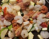 A picture of step 2 of Garlic shrimp & sausage skillet.