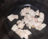 Foto del paso 2 de la receta: Arroz con chuleta de cerdo y maíz tierno