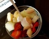 A picture of step 3 of Mixed Fruit, fresh Cream and Yogurt 😁.
