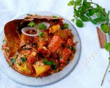 A picture of step 8 of Coconut milk aloo masala curry.