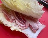 A picture of step 2 of Japanese mille feuille hot pot with pork belly and napa cabbage.