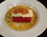 A picture of step 15 of Roasted Red Peppers Stuffed with pasta in a Garlic Broth.