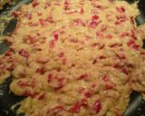 Foto del paso 4 de la receta Salmón al vapor con eneldo, calabacines gratinados rellenos de pimientos y frutos secos