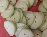 A picture of step 1 of Cucumber salad.