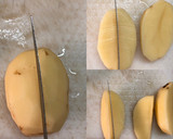 A picture of step 1 of Baked Spiced potato wedges with garlic Bechamel sauce.