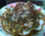 A picture of step 4 of Allo Tikki with white matar.
