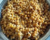 A picture of step 2 of Chana masala with poori.