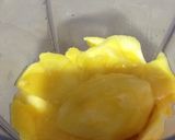 A picture of step 2 of Mango shake.