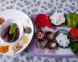 A picture of step 1 of Stuffed capsicums and tomatoes.