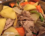 A picture of step 11 of Nikujaga (Japanese Potato and Pork Stew).