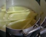 A picture of step 2 of Humitas (steamed fresh corn cakes).