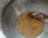 A picture of step 2 of Cheesy masala popcorn.