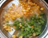 A picture of step 1 of Schezwan matar paneer corn masala.