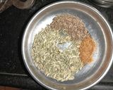 A picture of step 1 of Dana Methi stuffed Mirchi.