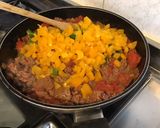Une image de l'étape 9 de Bœuf aux poivrons bicolores,tomates,herbes et épices.