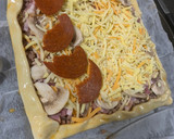Foto del paso 8 de la receta: Receta de pizza con masa de hojaldre
