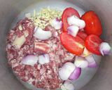 A picture of step 1 of Lobia qeema (white beans).
