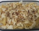 A picture of step 7 of Restaurant style cheese fries.