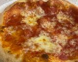 Foto del passaggio 4 della ricetta Pizza con la biga cotta nel fornetto Ferrari