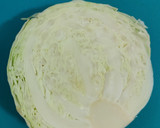 A picture of step 1 of Round cabbage with ham and onion.