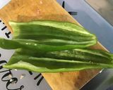 Une image de l'étape 6 de Aubergine italienne farcie au poulet haché et poivron vert.