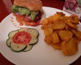 A picture of step 8 of Burger served with bhajias.