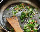 A picture of step 3 of Maggi chatpata tomato vegetables Chinese soup.