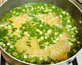 A picture of step 5 of Egg noodles in chicken broth.